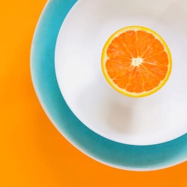 image of orange on plate